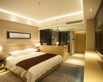 Lee Wan Hotel - דאליין - חדר שינה