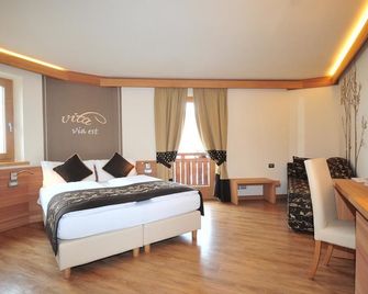 Hotel Bondi - ליביניו - חדר שינה