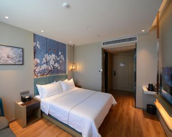 Magnotel Shiyan Dongfeng Avenue Airport - Shiyan - Habitación