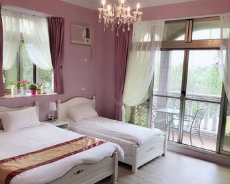 Yue Lai Ji - Minxiong Township - Bedroom