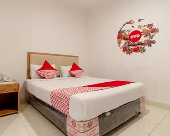 OYO 2410 Intan Hotel - Kutacane - Camera da letto