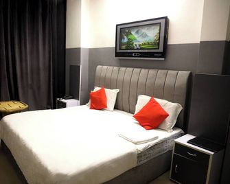 Hotel Dhruv Inn - Bareilly - Bedroom