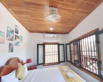 Elephant Boutique Hotel - Luang Prabang - Schlafzimmer
