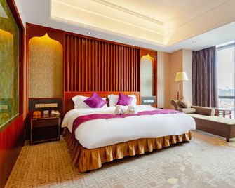 Guowei Hotel - Xishuangbanna - Habitación