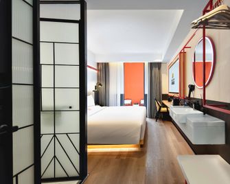 Xiamen Zhongshan Road Pedestrian Street Qulistar Hotel - Xiamen - Soveværelse
