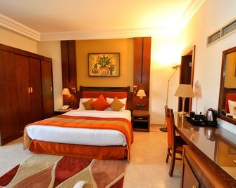 فندق أراكان عتابي الأقصر - الأقصر - غرفة نوم