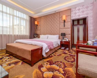 Donghua Hotel Bazhong - Bazhong - Bedroom