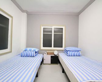 Yusun Guesthouse - Busán - Habitación