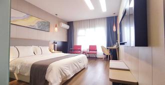 Thank Inn Chain Hotel Sichuan Nanchong - Nanchong - Bedroom