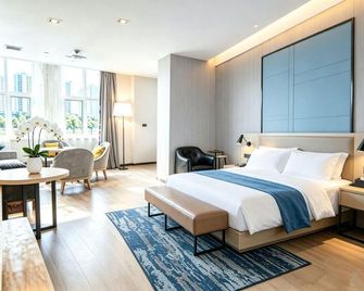 Echarm Hotel Huanggang ist Xihu Road Juran Home - Huanggang - Bedroom