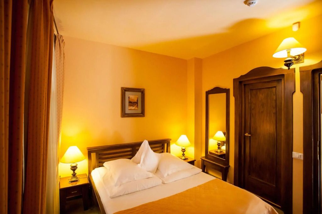 Hotel Bella Muzica - בראסוב - חדר שינה