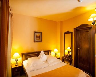 Hotel Bella Muzica - בראסוב - חדר שינה