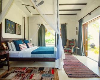 Qambani Luxury Resort - Pingwe - Schlafzimmer