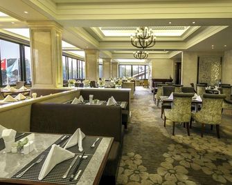 Grand Inn Xijiao Apartment Hotel - Shangai - Restaurante