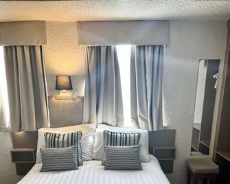 Clifton Court Metro Hotel - בלקפול - חדר שינה