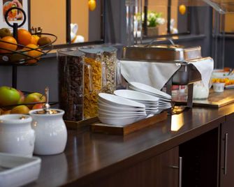 Orange Hotel und Apartments - Neu Ulm - Buffet