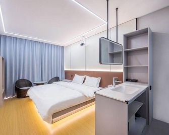 Yuhuage Hotel - Dalian - Slaapkamer