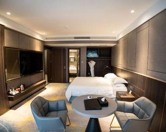 Wanxing Hotel - Dazhou - Bedroom