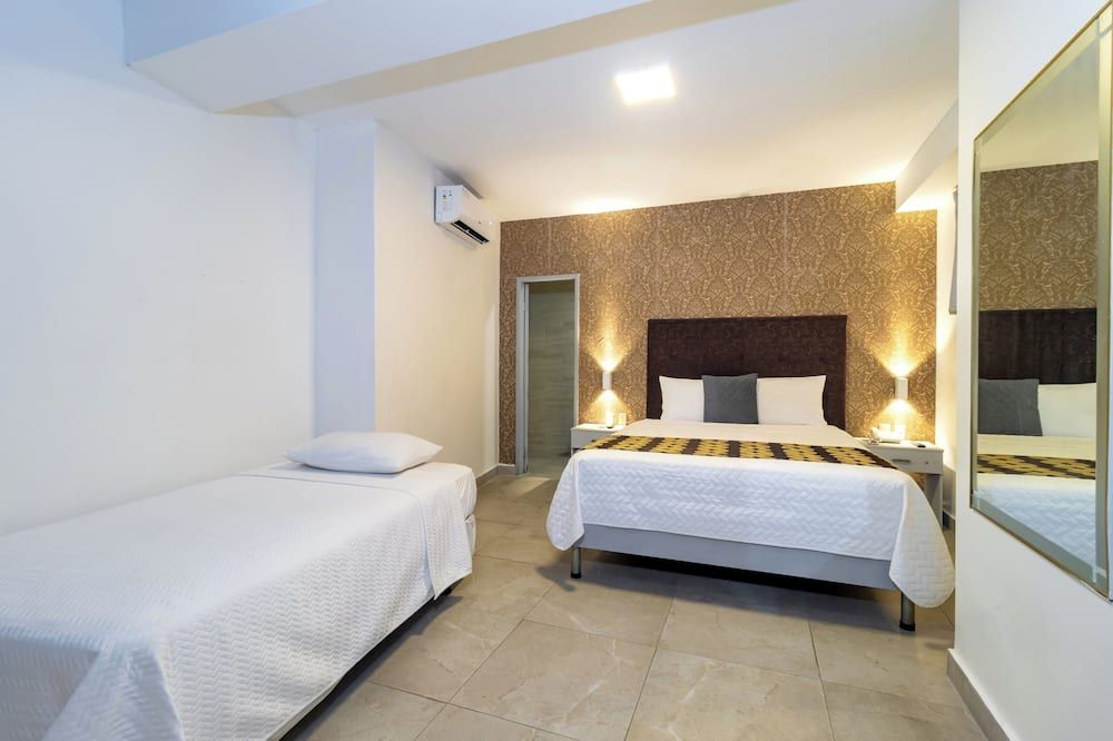 أوتيل بريزيدينتي إنترناسيونال - غواياكيل - غرفة نوم