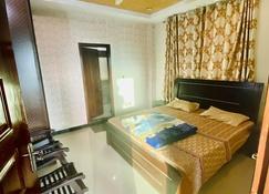 Green Valley Apartments - Bhurban - Bedroom