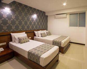Ceyloni City Hotel - Kandy - Slaapkamer
