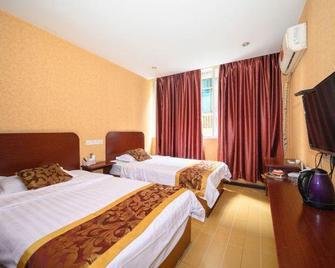 Tiandixiu Inn - Neijiang - Bedroom