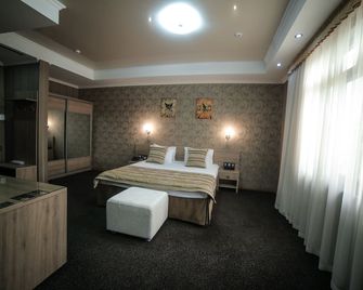 Onyx Hotel Bishkek - Biškek - Makuuhuone