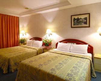 Empire Hotel - Luzhou District - Bedroom