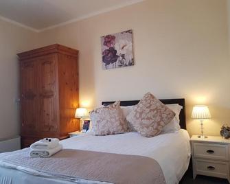 Waterfront Hotel - Deal - Schlafzimmer