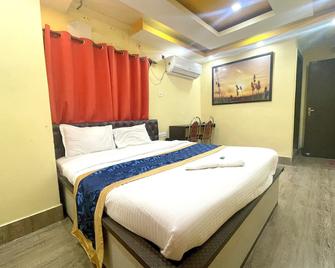 Hotel Asmeet Kolkata - Calcuta - Habitación
