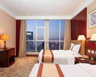Tianjin Huigao Garden Hotel - Tianjin - Bedroom