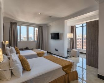 Golden Tulip Dar Es Salaam City Center Hotel - Dar es Salaam - Habitación