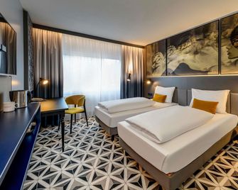 Mercure Hotel Freiburg am Münster - פרייבורג אים ברייסגאו - חדר שינה
