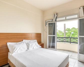 Piuma Palace Hotel By OYO Rooms - Piúma - Quarto