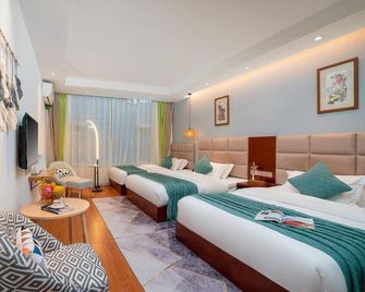Yuanmeng Hotel - 麗江 - 臥室