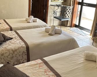 Green Grove Guest House - San Giuliano - Camera da letto