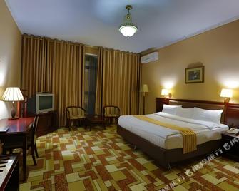 Asia Grand Hotel - دوشانبي - غرفة نوم