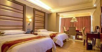 Liri Wangchao Hotel - צ'נגשה - חדר שינה