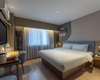 Home Inn Neo Nanchang Bayi Square First Affiliated Hospital - Nanchang - Habitación