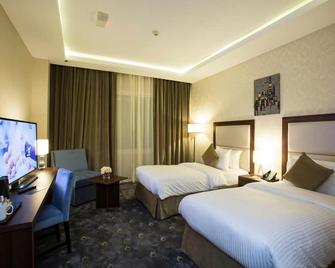 The Town Hotel Doha - โดฮา - ห้องนอน