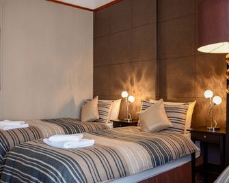 Tanes Hotel - קארדיף - חדר שינה