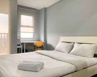 Tranquil Living Studio at Belmont Residence Puri Apartment By Travelio - Giacarta - Camera da letto
