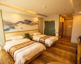 Jun Yue Hotel - Qiqihar - Habitación