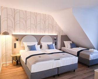 Guestified Liyana Hotel - Ratingen - Habitación