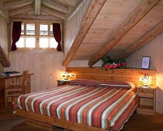 Hotel Garni Plueme - Sauris - Habitación