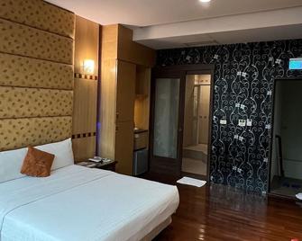 Charming Motel - Hualien City - Schlafzimmer