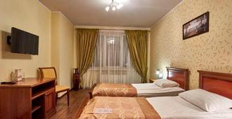 Pioneer Luxe Hotel - Saratov - Slaapkamer