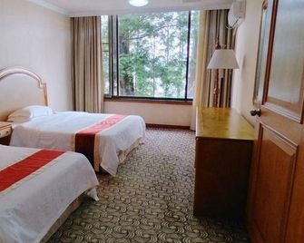 Songtao Hotel - Yunfu - Bedroom