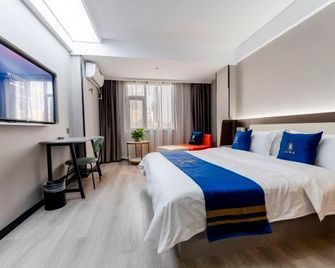 Motel 168 Hefei Changjiang Road Amber Resort Branch - Hefei - Habitación