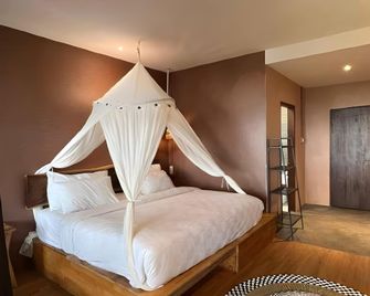 Hotel Kalang Ulu - Berastagi - Schlafzimmer